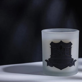 Signature Sunday candle by DMJ Home Fragrance in frosted glass with black embossed crest label
