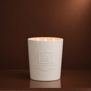DMJ Home Fragrance Big Boy triple-wick coconut wax luxury candle in white embossed vessel with three lit wicks, hand-poured in Lafayette, Louisiana